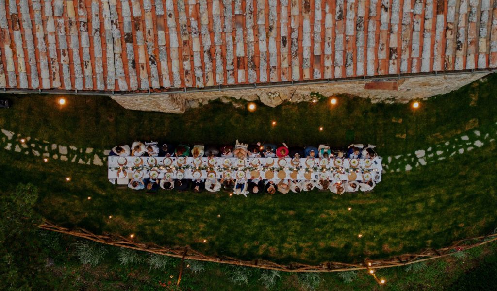 Alfresco dinner at Nikis Resort destination wedding in Umbria, Italy.