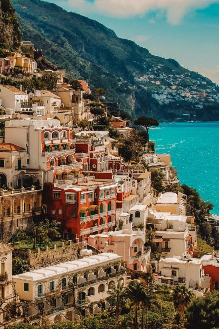 A high angle shot of the beautiful buildings by the Amalfi Coast captured in Italy